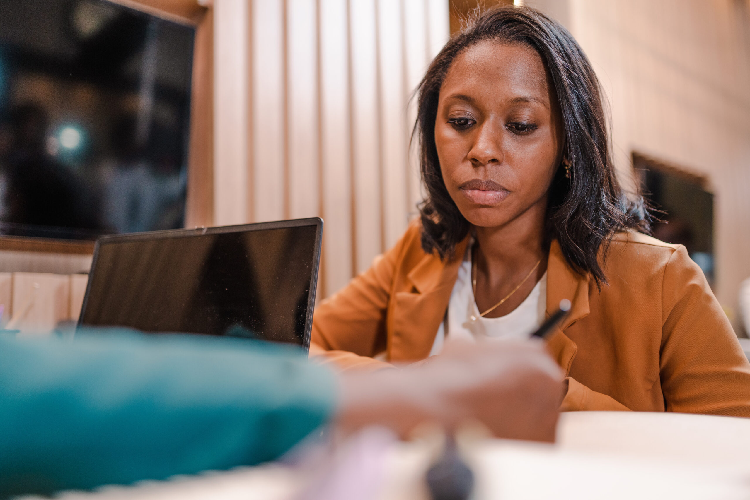 Lady having information explained to her.