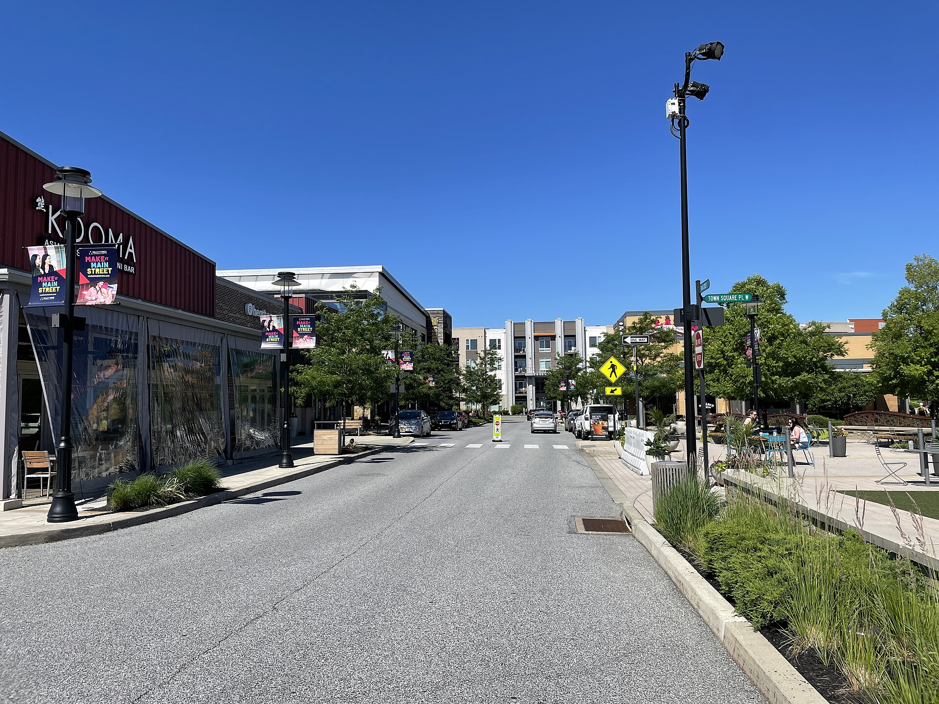 View of Main Street and Town Square area at King of Prussia Town Center, featuring outdoor shopping, dining, and walkable plaza in Pennsylvania